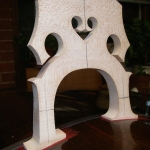 Bridge fitting, to allow for sunken arching in top.