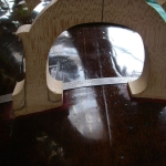 Bridge fitting, to allow for sunken arching in top.